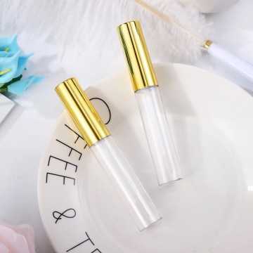 Tube de gloss et brillant à lèvres en plastique transparent avec applicateur intégré et capuchon métal doré - Fati Pack Emballag