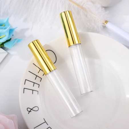 Tube de gloss et brillant à lèvres en plastique transparent avec applicateur intégré et capuchon métal doré - Fati Pack Emballag