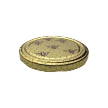 couvercle premium en métal doré, orné d’abeilles, pour refléter la richesse de votre miel - Fati Pack Emballage Maroc