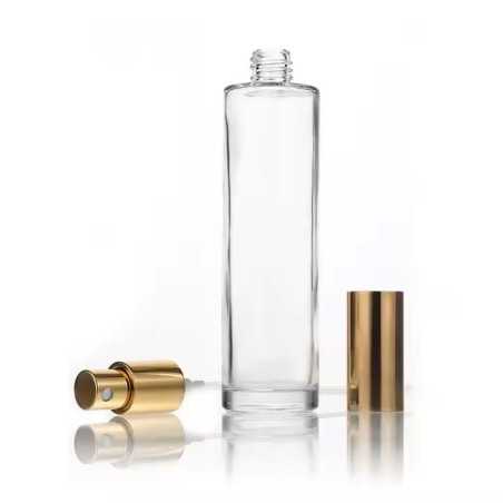 Flacon vaporisateur en verre transparent avec pompe spray dorée et bouchon métallique doré parfums, brumes ou soins cosmétiques