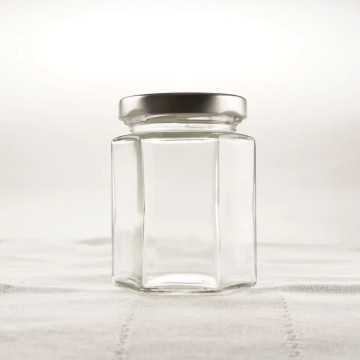 Bocaux alimentaires en verre hexagonal hermétique avec couvercle métal noir ou argenté - Fati Pack Emballage Maroc