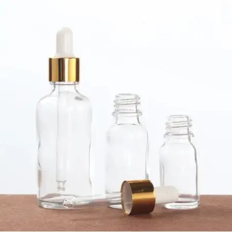 Flacons Cosmétiques Transparent avec Couvercle Doré et Pipette Blanche - Fatipack Group Emballage Maroc
