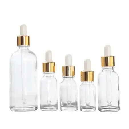 Flacons Cosmétiques Transparent avec Couvercle Doré et Pipette Blanche - Fatipack Group Emballage Maroc