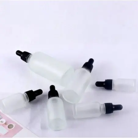 Flacon Compte-Gouttes en Verre Semi-Transparent Givré avec Pipette Noire - Fatipack Group Emballage Maroc