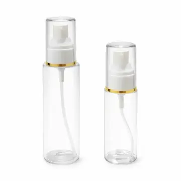 Flacons cosmétiques transparents à pompe blanche et finition dorée - Fatipack Group Emballage Maroc