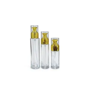 Flacon luxe en verre transparent avec pompe dorée pour cosmétiques - Fatipack Group Emballage Maroc