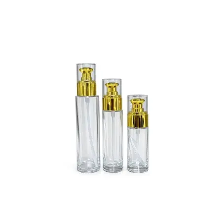 Flacon luxe en verre transparent avec pompe dorée pour cosmétiques - Fatipack Group Emballage Maroc