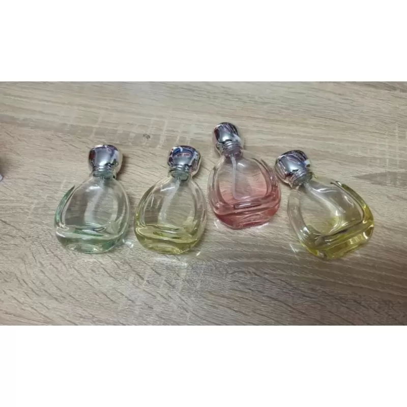 Flacon en verre coloré rechargeable pour parfum avec bouchon argenté 30ml