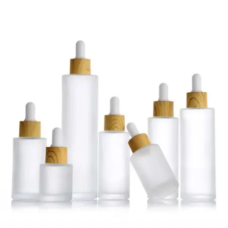 Flacon Laura en verre givrée avec compte gouttes et cercle en bambou pour l'emballage cosmétique 50ml - Fati Pack Packaging Maro