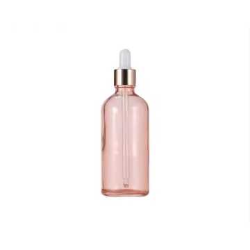 Flacon compte-gouttes en verre rose cerise de 100 ml avec compte-gouttes en or rose - Fati Pack Emballage cosmétique Maroc