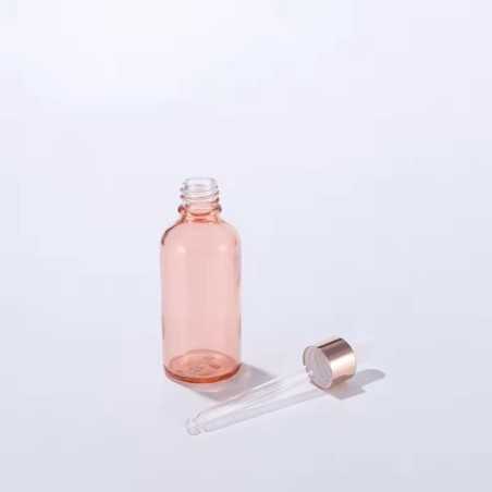 Flacon compte-gouttes en verre rose cerise de 100 ml avec compte-gouttes en or rose - Fati Pack Emballage cosmétique Maroc