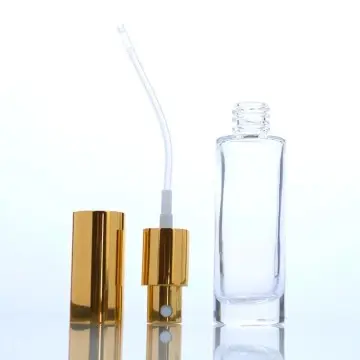 Flacon de parfum en verre transparent avec bouchon à pompe à épaulement plat doré - Fati Pack Group